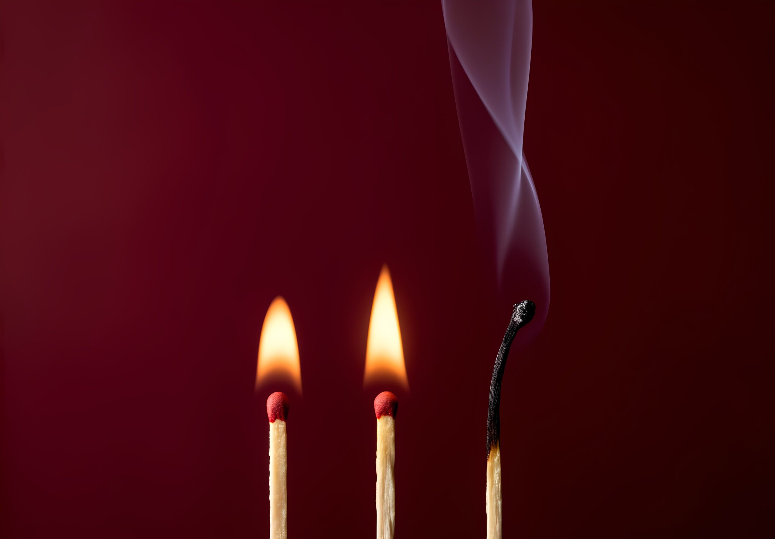 Two lit matches and one extinguished match representing longer lasting effect